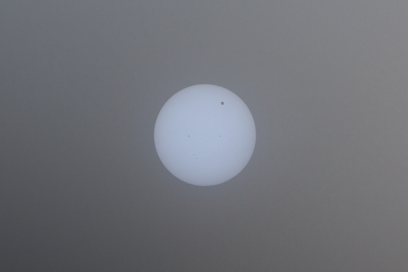 Venus (upper right) transit of the Sun